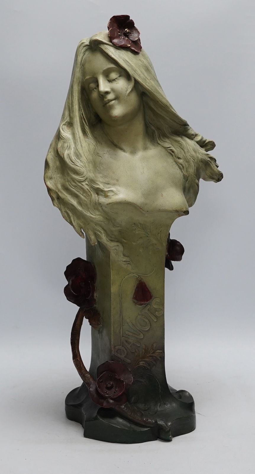 Rene Charles Masse (French, 1855-1913), an Art Nouveau figural terracotta bust 'Pavots', modelled with poppies in her hair and around the plinth, signed, 31cm wide, 63cm high
